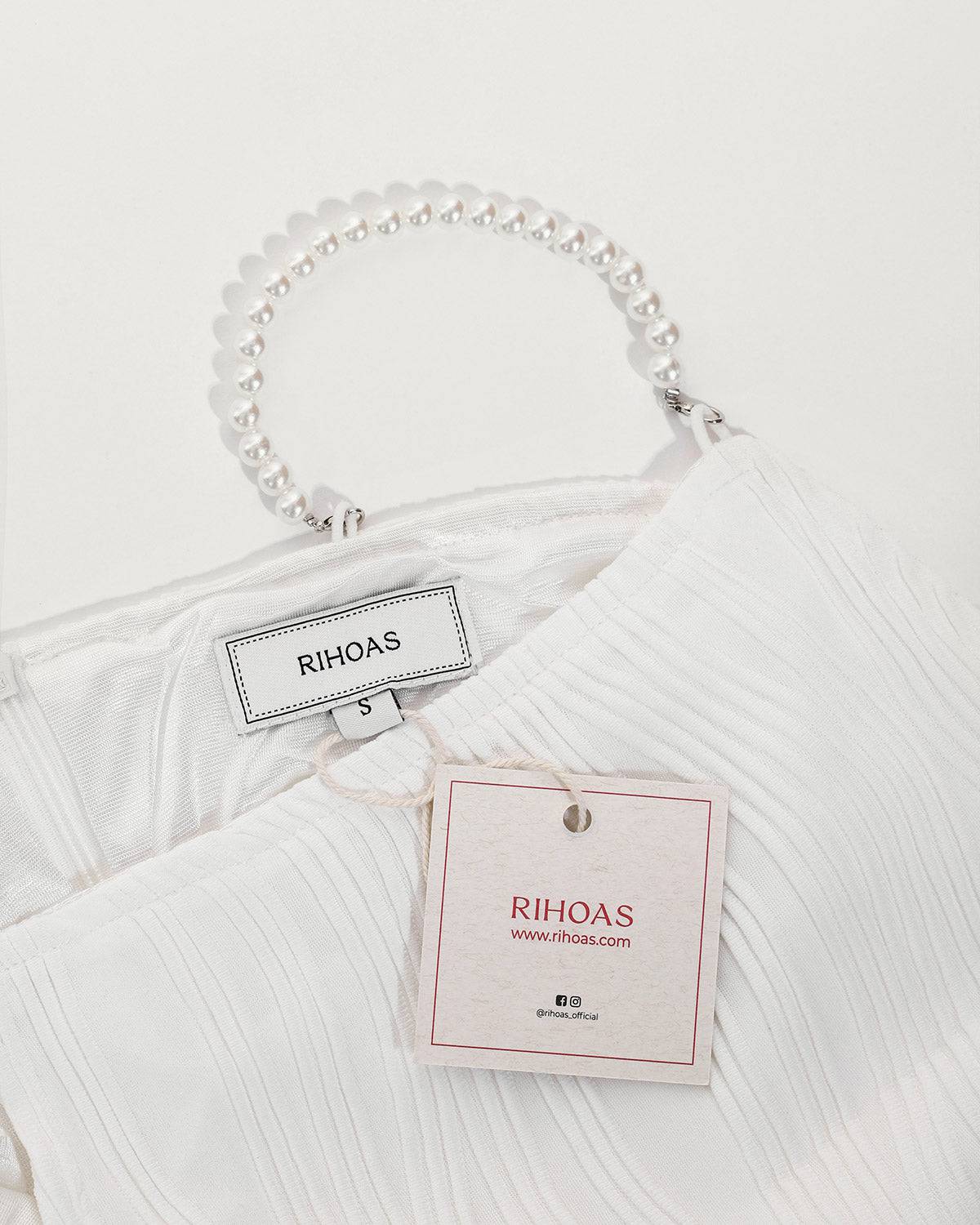 LB | Elegancka sukienka midi na wąskich ramiączkach w nowoczesnym stylu
