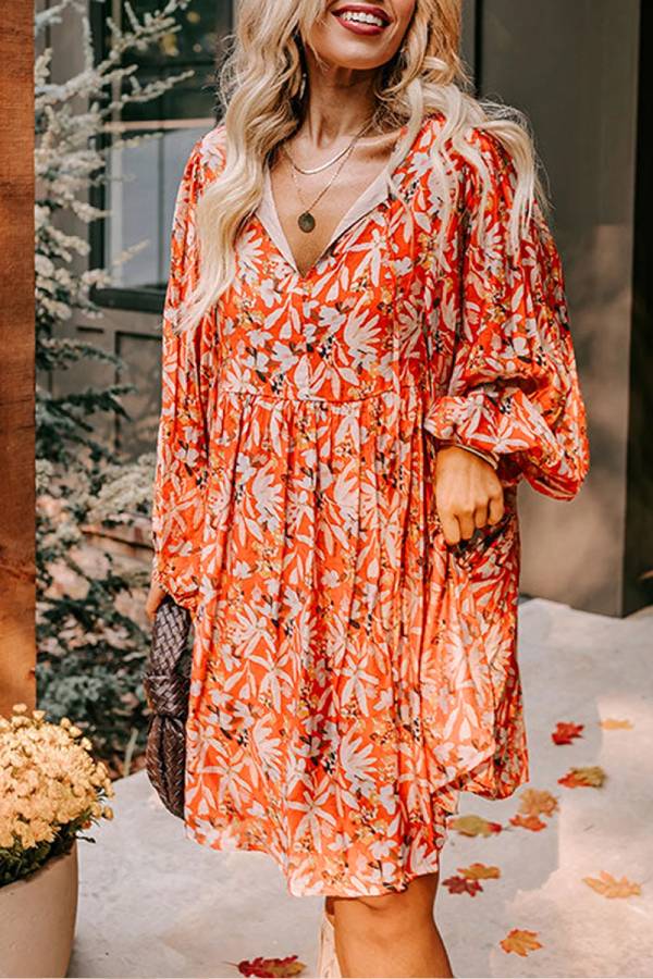 LB | Pomarańczowa sukienka midi w kwiaty z rozcięciem pod szyją i bąbelkowym rękawem Plus Size