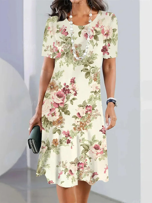 LB | Elegancka sukienka midi w luźne kwiaty na garden party z okrągłym dekoltem
