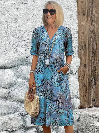 LB | Elegancka i nowoczesna sukienka midi