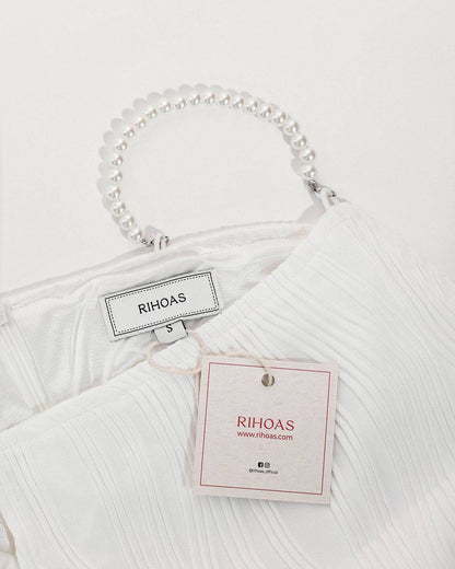 LB | Elegancka sukienka midi na wąskich ramiączkach w nowoczesnym stylu