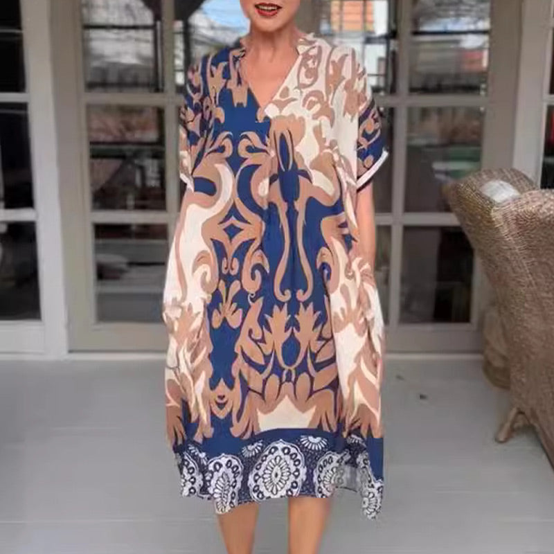 LB | Dopasowana sukienka midi z eleganckim nadrukiem